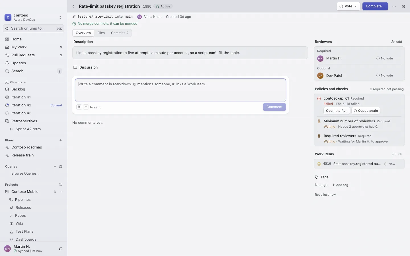 A pull request's overview with its reviewers and votes, required checks and linked Work Items